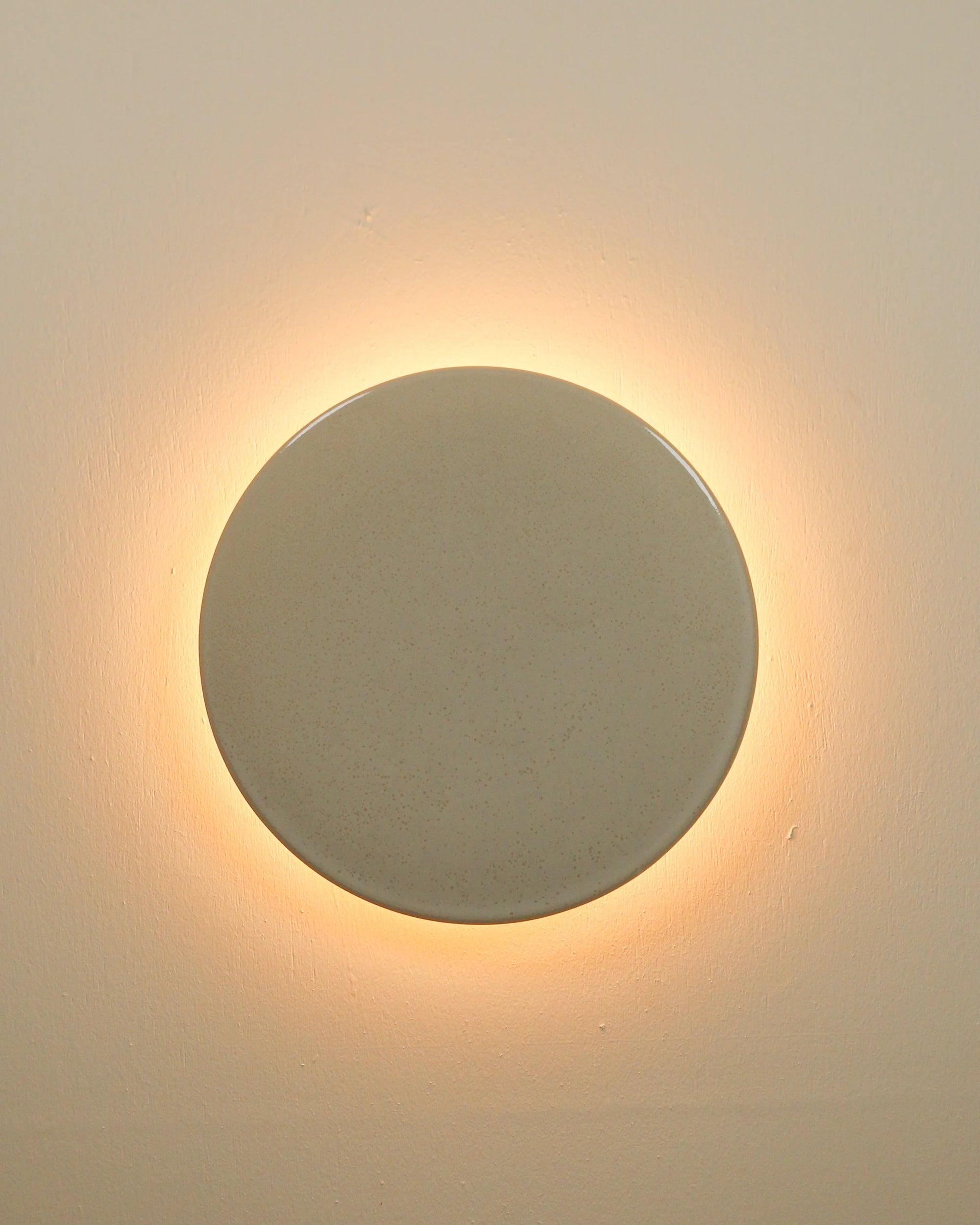 Ceramic Disc Wall Light