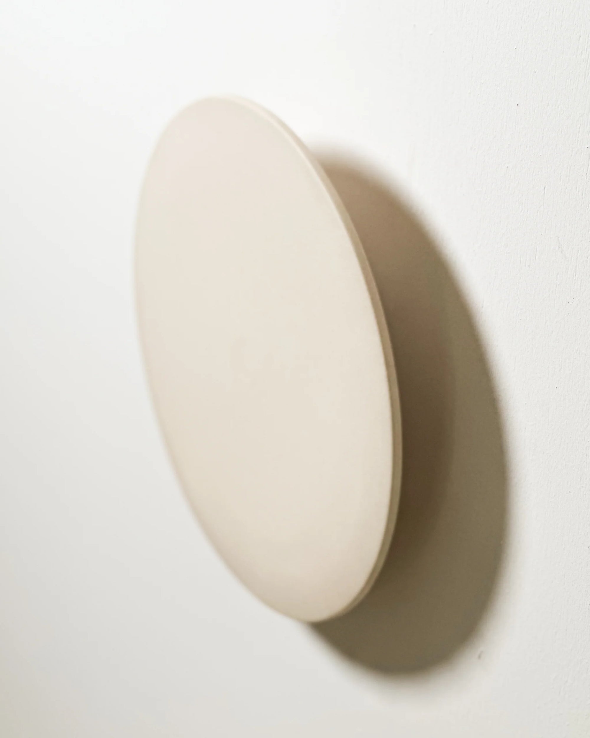 Ceramic Disc Wall Light